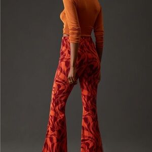 Anthropologie Red and Orange Patterned Flare Pants